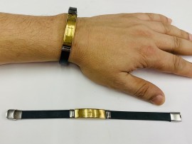 Pulseira borracha com chapinha dourada ( orao pai nosso) fecho de ferro ) ,cada